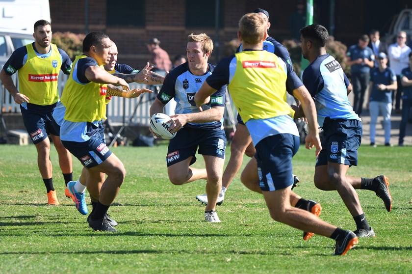 Jake Trbojevic looks to get past brother Tom in Brydens Lawyers NSW Blues training.