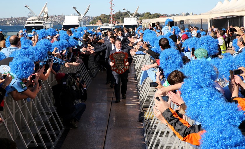 Paul Gallen marches the shield through a sea of Blatchys Blues at a celebratory welcome home at the Sydney Opera House.