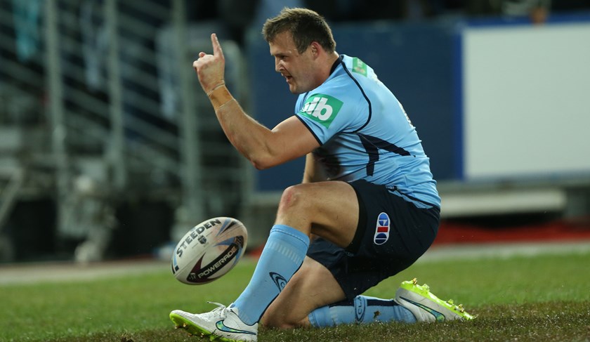 Good times: Josh Morris celebrates an Origin try in 2015