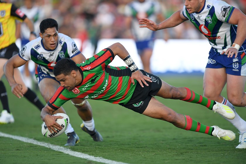 Cody Walker scores one of his four tries for the Rabbitohs against the Warriors. 