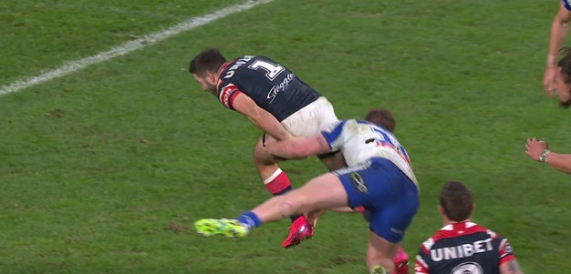 Tedesco jinks his way past two Bulldogs for his hat-tric