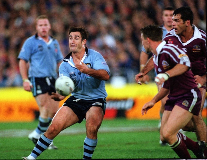 Andrew Johns fires out a pass - State of Origin Game 3 at Stadium Australia on Wednesday June 26th, 2002. Photograph taken on colour negative by Colin Whelan © Action Photographics