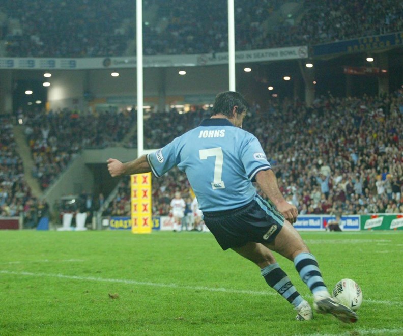 Andrew Johns kicks  - RUGBY LEAGUE STATE OF ORIGIN GAME 3, NSW V QLD at Lang Park, Wednesday July 16th 2003. Digital image by Colin Whelan, © Action Photographics