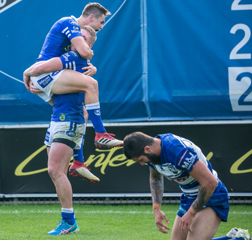 MATCH-WINNERS: Kyle Flanagan celebrates with Aaron Gray after the centre scored his second try