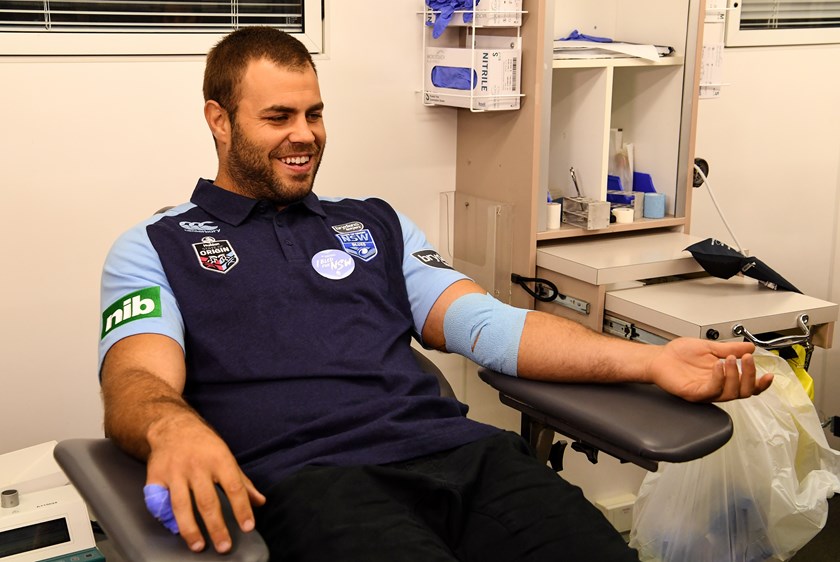 FOR THE CAUSE: Wade Graham gives blood at the NRL's 'Out For Blood' launch.