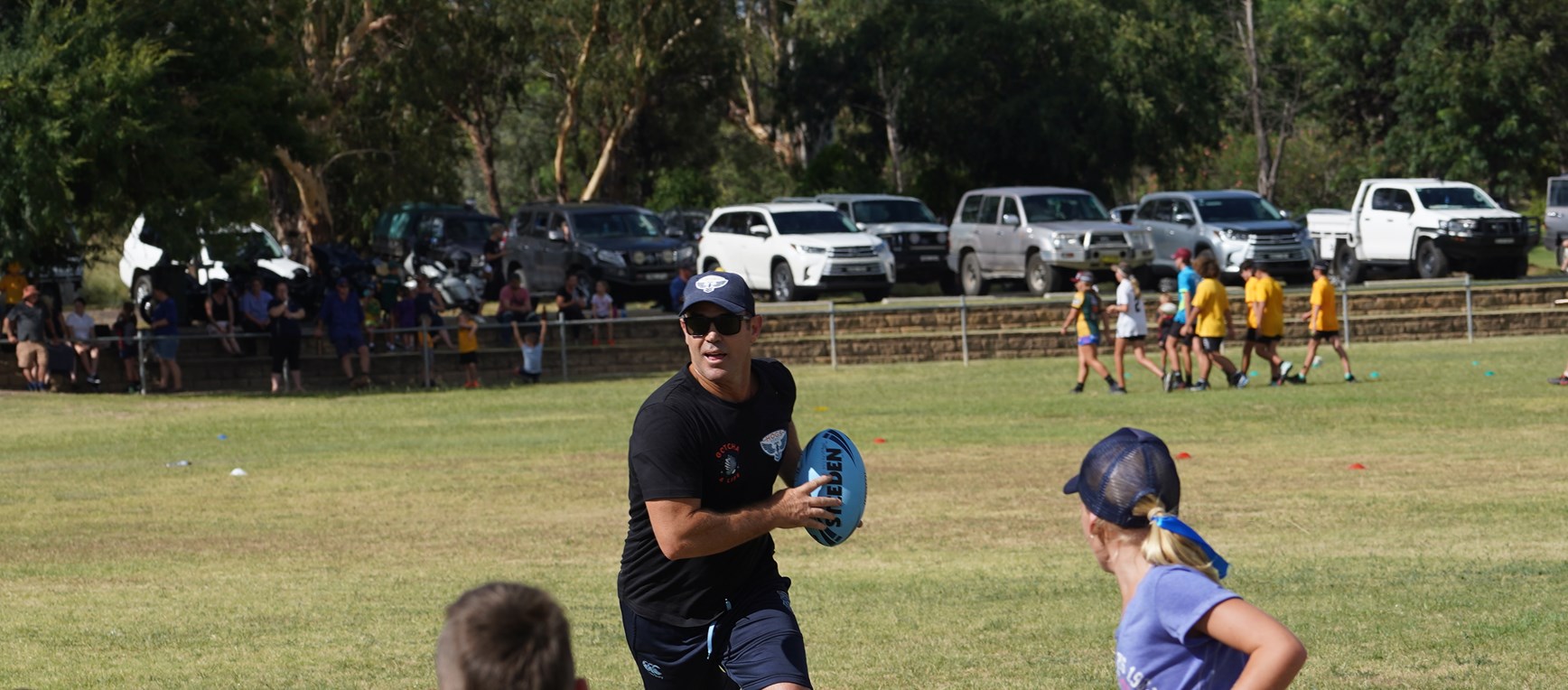 Fittler shows off skills at footy clinic