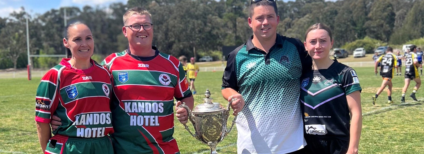 The Kandos Waratahs and Blackheath Blackcats Open Men's and Blues Tag captains with the time-honoured Blayney Cup and Mid West Blues Tag trophy