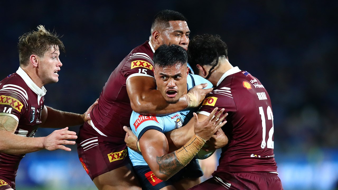 Reduced to 12 men the NSW Blues fought hard but finally were ...