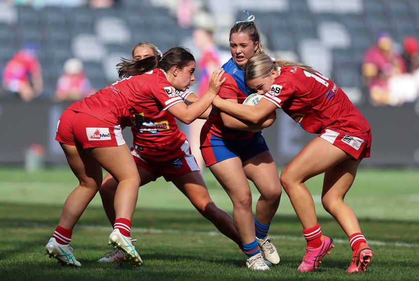 Knights lock Makaah Darcy in the 2024 Tarsha Gale Cup final. Photo at top, Bulldogs five-eighth Evelyn Roberts in the 2024 Lisa Fiaola Cup final. PHOTOS: Bryden Sharp