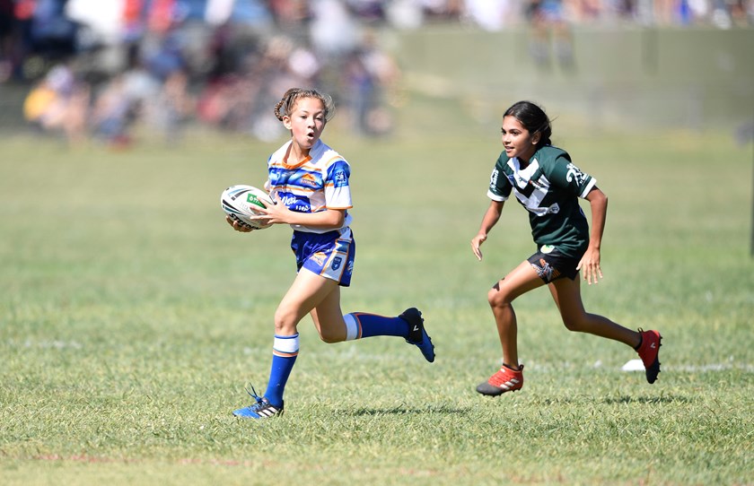 The Mount Druitt Lions in action in the Penrith District Junior Rugby League's all-girls competition.