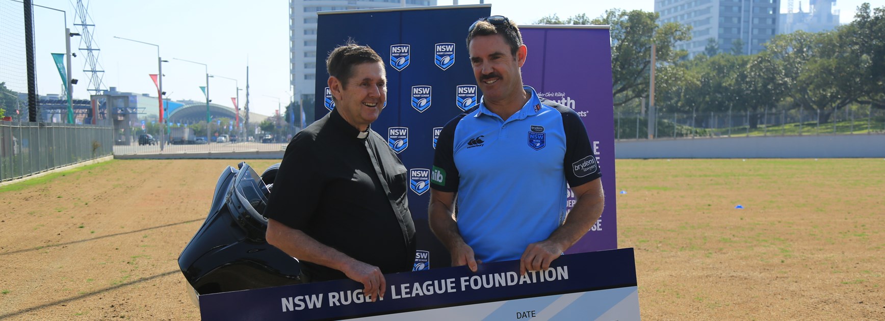 Fittler presents cheque as Hogs total hits $760,000