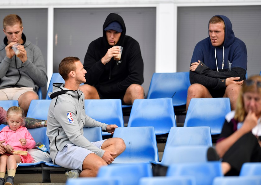Daly Cherry-Evans talks with Manly teammates Jake and Tom Trbojevic as the Blacktown Workers Sea Eagles play in the Intrust Super Premiership NSW.