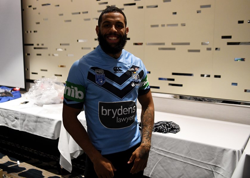 Josh Addo-Carr tries on his 2018 Brydens Lawyers NSW Blues jersey for the first time after joining camp on Monday.