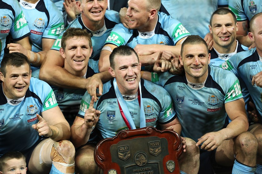 Paul Gallen celebrates with the Origin-winning NSW side in 2014.